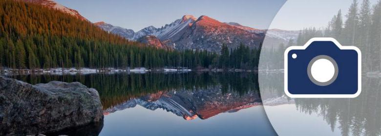 相机图标在宁静的山湖场景横幅
